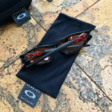 Vintage Oakley Straight Jacket Black/Orange Flames Sunglasses (1999)