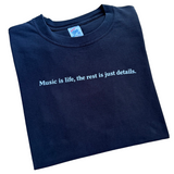 Vintage “Music is life” Text T-Shirt X-Large (1990s)
